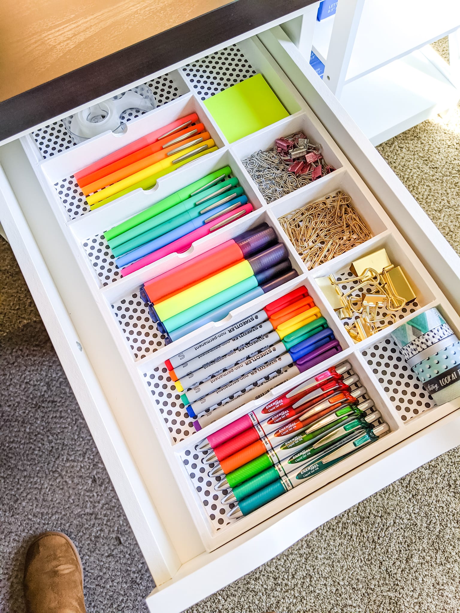 Drawer with organized office supplies for a homework station