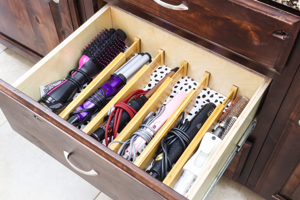 https://practicalperfectionut.com/wp-content/uploads/2022/02/hair-tools-bathroom-drawer-organization-1024x683.jpg