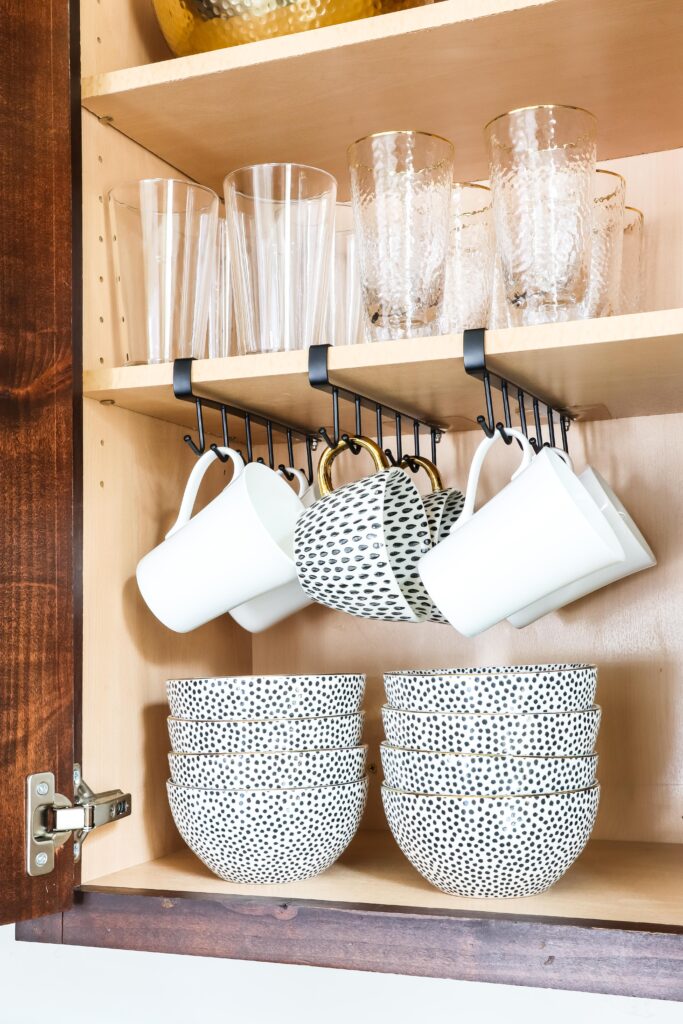 Hanging mugs under online shelf