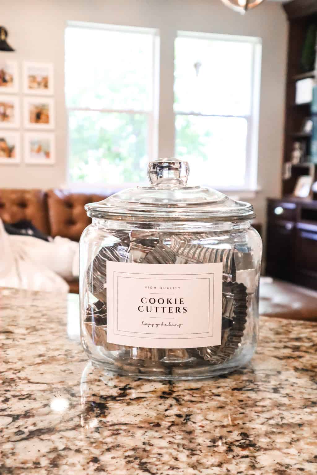 organize cookie cutters in a glass jar on the counter to create a beautiful baking station