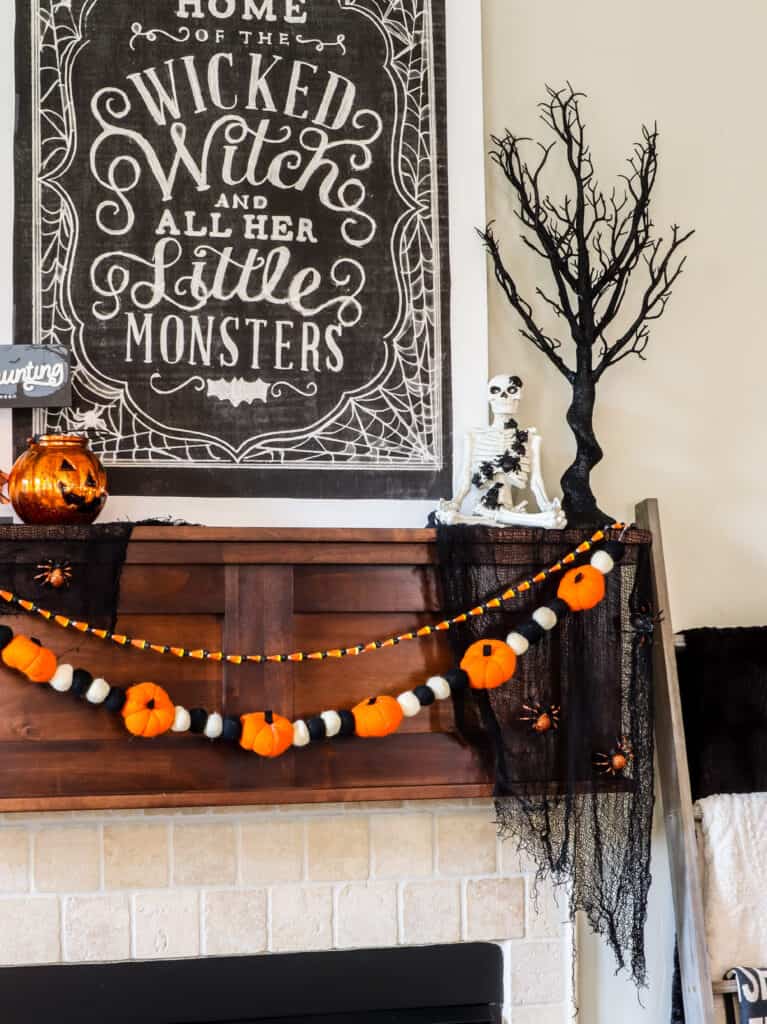 spooky halloween garlands on a mantel