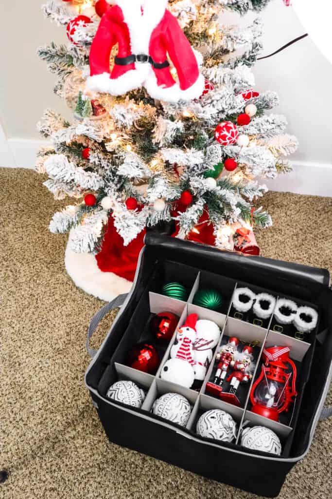 kids bedroom mini christmas tree with ornaments organized in a box
