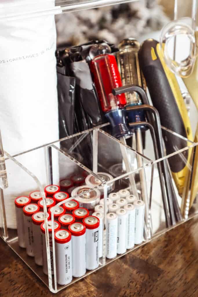 Christmas morning essentials in an organized bin