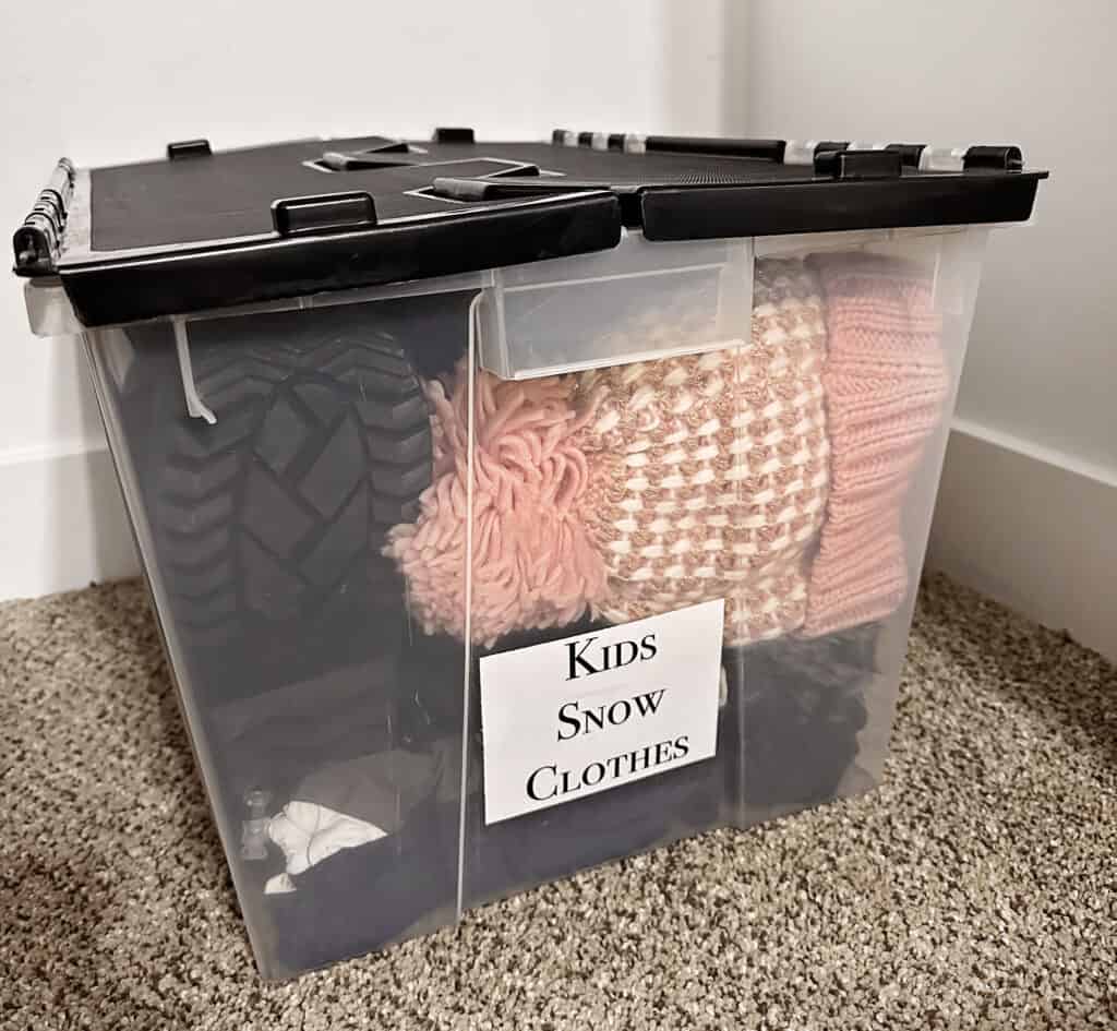 storing kids snow clothes in totes for off season