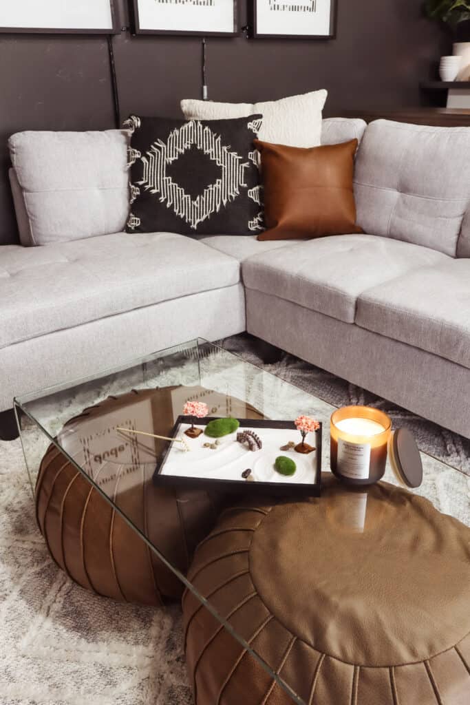 glass coffee table with poufs for extra seating in a teen hangout space