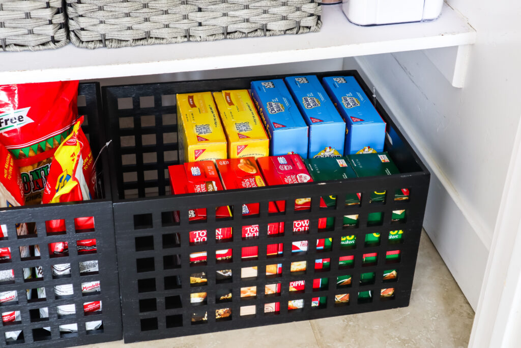 store extra snacks on the pantry floor in a bin